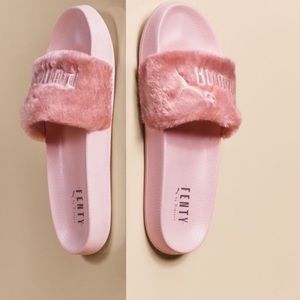 black furry puma slides